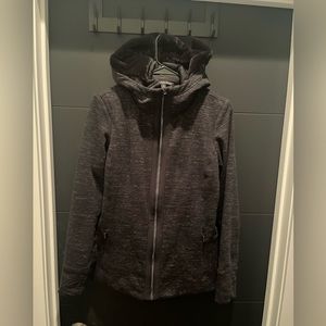 medium weight jacket with velvet lining everywhere but sleeves. Super soft!